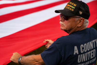 A County United Flag Unfurling - Veteran Image